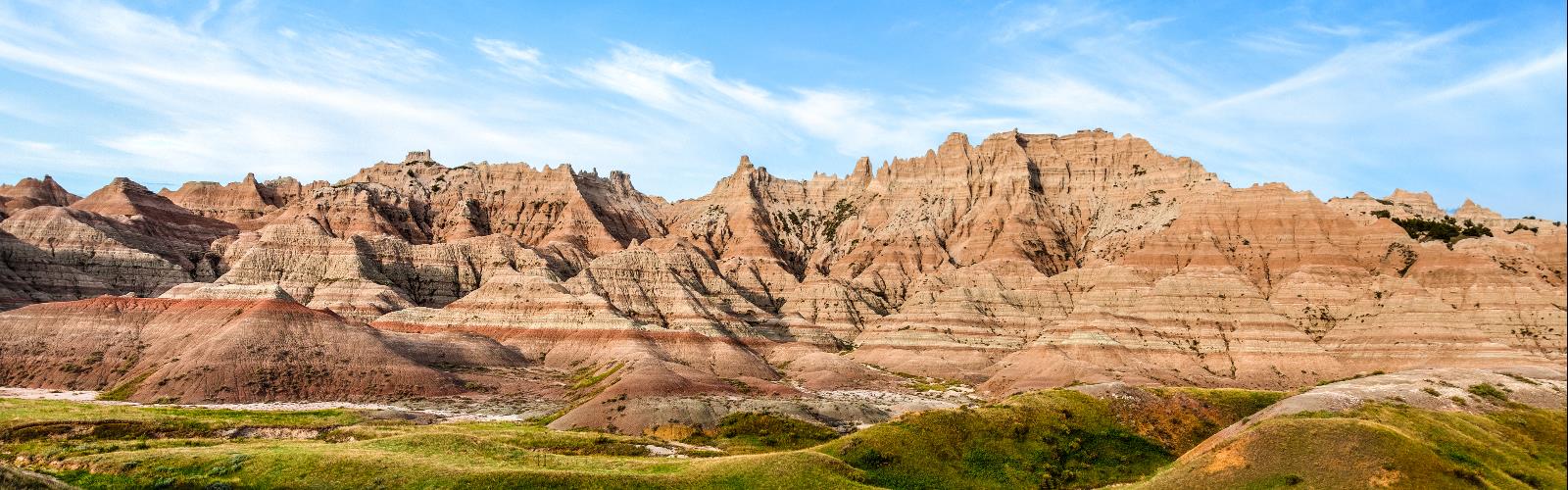 Hiking in South Dakota - natural landscape  mountain rock valley outdoor grass canyon sky nature landscape cloud desert rocky badlands escarpment outcrop plant wadi hillside stone