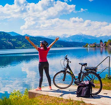outdoor water sky lake bicycle bicycle wheel sports equipment bike mountain vehicle person cycle Land vehicle Vehicle