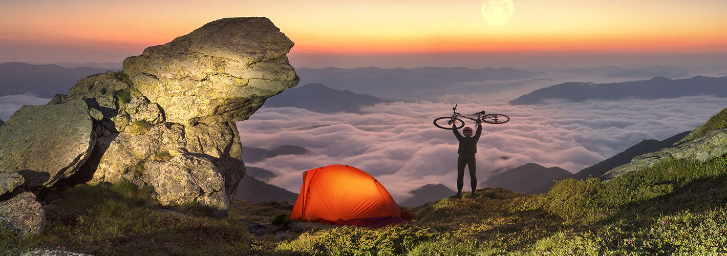 Mountain Biking  outdoor sky mountain sunset rock nature rocky cloud hiking sunrise overlooking setting beautiful distance hillside mammal animal tent land