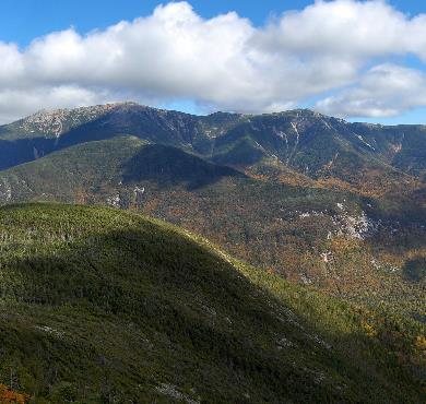 New Hampshire  mountain sky outdoor grass nature cloud landscape hill hillside background fell overlooking mountain range grassy green hill station massif ridge lush distance land highland