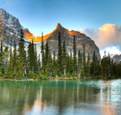 Larch Valley, Banff National Park, Alberta trail - hiking in Canadian Rockies  outdoor tree nature snow sky landscape mountain water pond lake forest surrounded